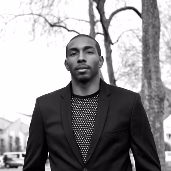 Portrait of DeMarcus Nelson, VP of Busniess Development.